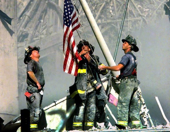 Firefighters with flag